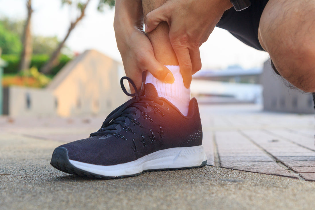 Pain on the outside of the ankle caused by peroneal tendonitis from repetitive strain