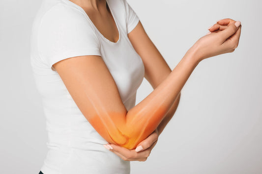 Sharp elbow pain and swelling from olecranon bursitis caused by repeated pressure on the joint