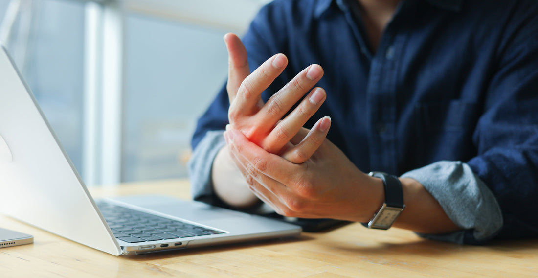 Person experiencing thumb irritation and pain caused by an ill-fitting wrist brace rubbing against the thumb area