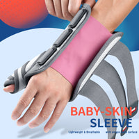 Close-up of FEATOL pink wrist brace baby-skin sleeve being put on, highlighting soft breathable lining.
