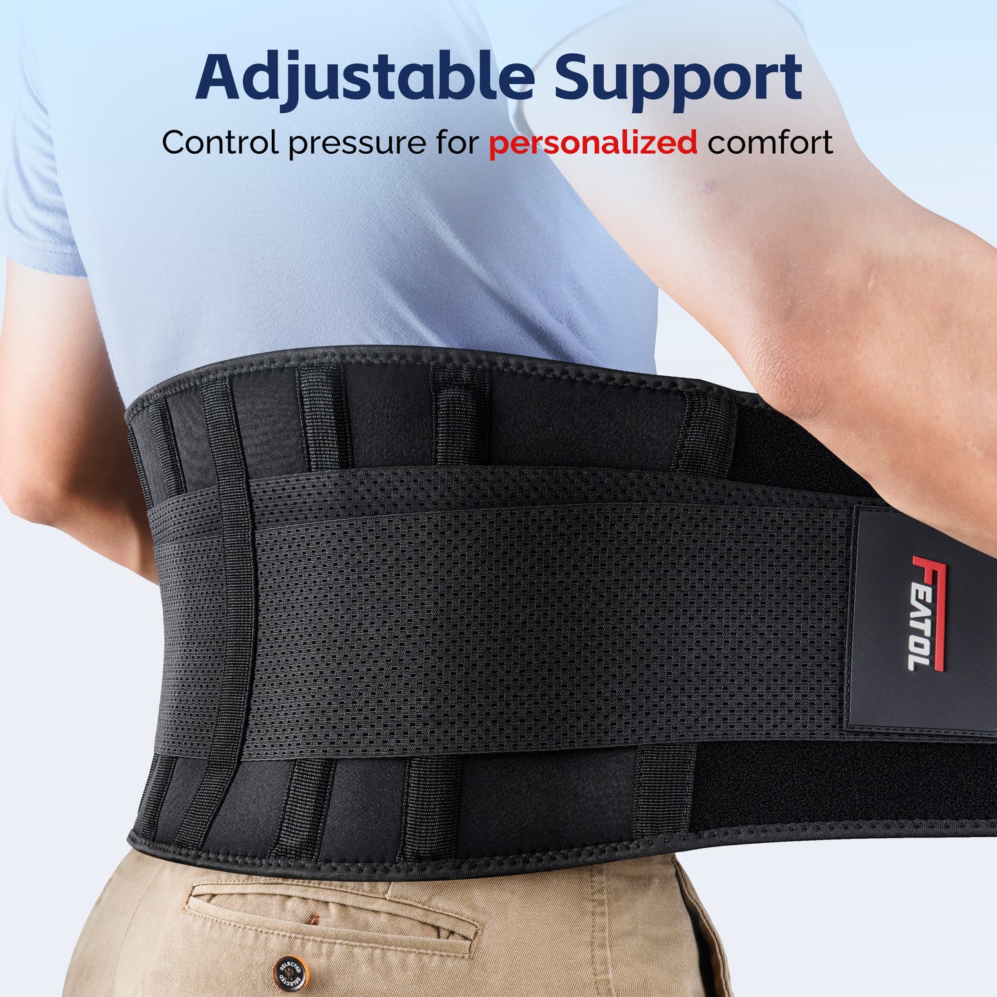 Person adjusting FEATOL back brace straps, showing breathable mesh surface, FEATOL logo label, and multiple hook-and-loop adjustment points for personalized compression and lumbar comfort