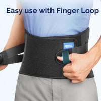 Person pulling on FEATOL back brace using built-in finger loop tab on the front panel, demonstrating easy one-handed application and removal with FEATOL logo label visible