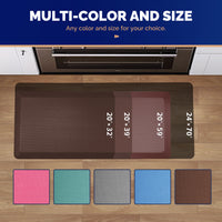 Overhead view of brown FEATOL anti-fatigue kitchen floor mat in front of oven showing four available sizes 20x32 20x39 20x59 24x70 inches with five color swatches pink teal gray blue and brown