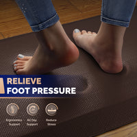 Bare feet standing on brown FEATOL anti-fatigue standing mat with text relieve foot pressure and icons for ergonomics support, all-day support, and stress reduction