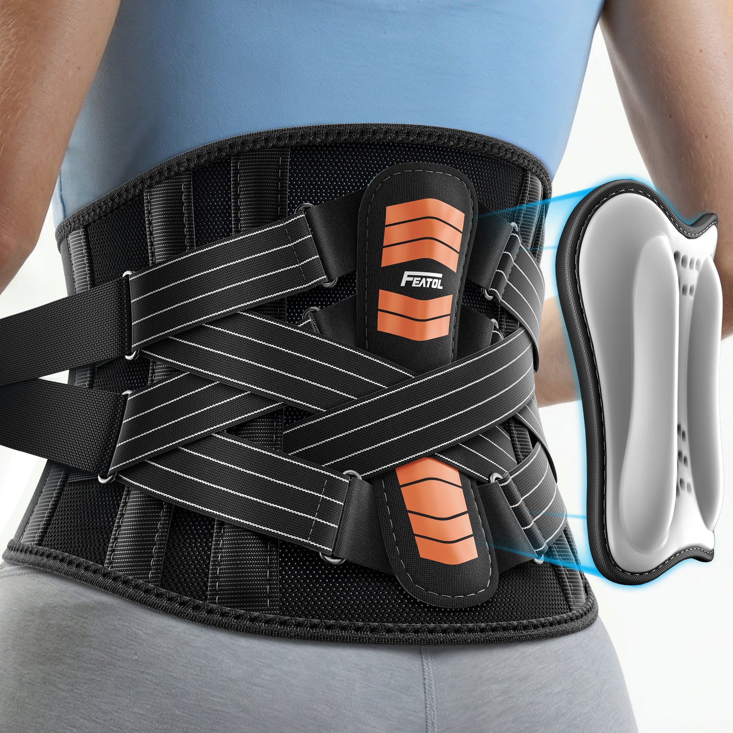 FEATOL back brace worn from behind, showing X-compression straps and removable orange lumbar pad.