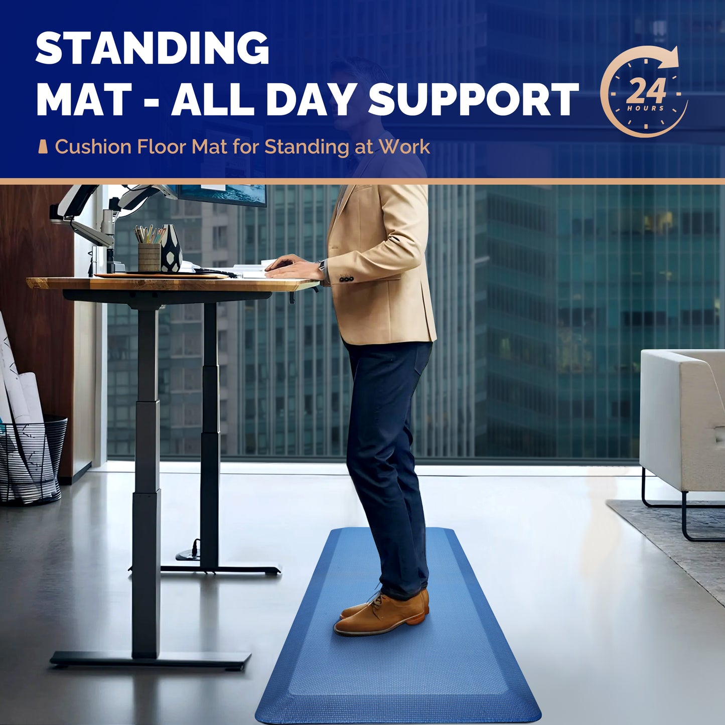 Professional man in blazer standing on blue FEATOL anti-fatigue mat at height-adjustable standing desk in modern high-rise office, ergonomic cushion floor mat for all-day standing comfort