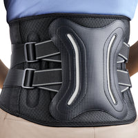 FEATOL gray lower back brace worn from behind, blue arrows showing bidirectional compression force on spine.