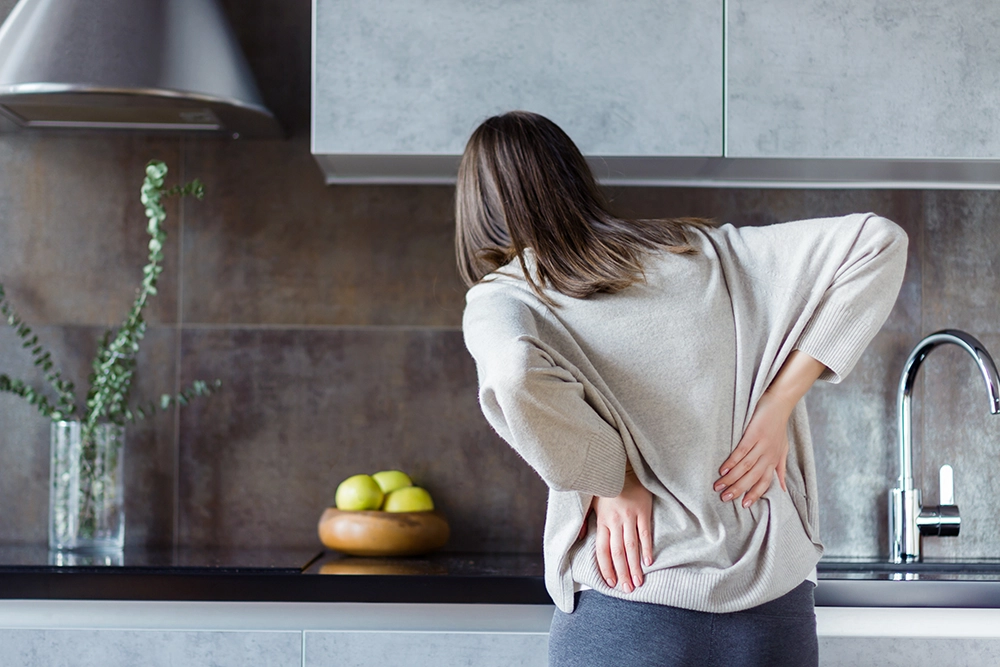 Back pain from standing long hours without support